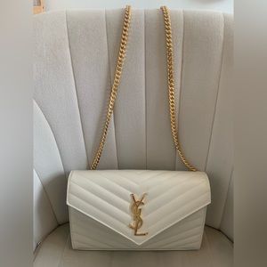 CASSANDRE MATELASSÉ CHAIN WALLET IN GRAIN DE POUDRE EMBOSSED LEATHER